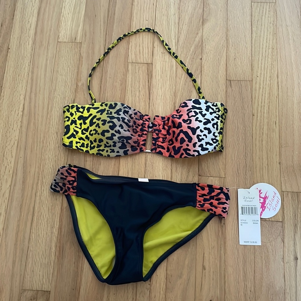 Colorful cheetah bathing suit. NWT. Top can be worn multiple ways!
